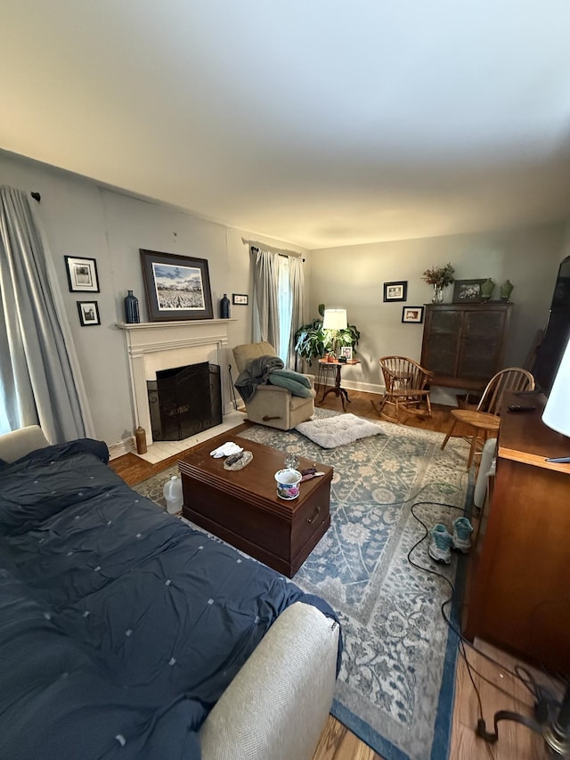 3508 General Bate Dr, Nashville, TN 37204 - living room with a fireplace with flush hearth, baseboards, and wood finished floors