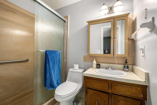 3225 Towne Village Rd E, Antioch, TN 37013 - bathroom with vanity, a shower stall, and toilet