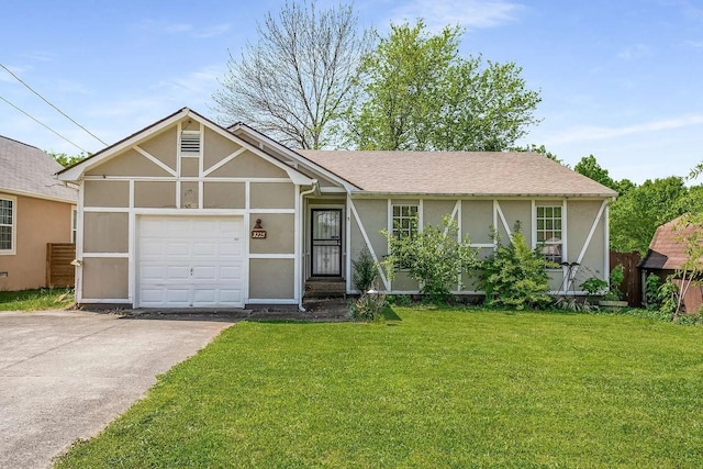 3225 Towne Village Rd E, Antioch, TN 37013 - view of front of house with stucco siding, a front yard, a garage, and concrete driveway