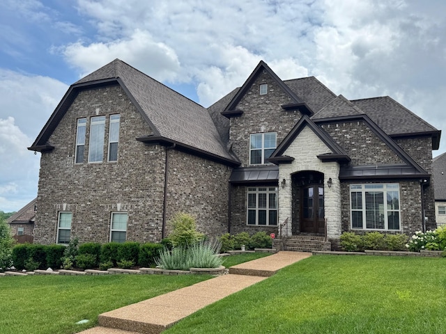 503 Montrose Dr, Mount Juliet, TN 37122 - view of front of house featuring a front yard, brick siding, and a shingled roof