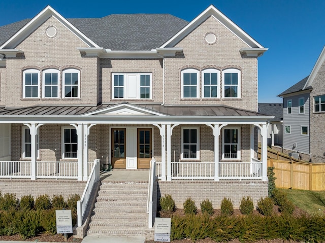3174 Long Branch Cir, Franklin, TN 37064 - view of front of property with covered porch, a standing seam roof, brick siding, and metal roof