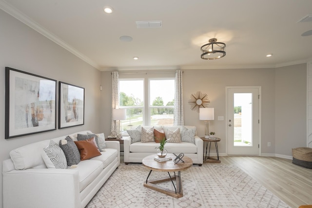 5047 Dayflower Dr, Hermitage, TN 37076 - living area with healthy amount of natural light, light wood-type flooring, ornamental molding, baseboards, and recessed lighting