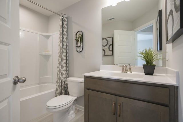 5047 Dayflower Dr, Hermitage, TN 37076 - bathroom with toilet, vanity, shower / bathtub combination with curtain, wood finished floors, and baseboards