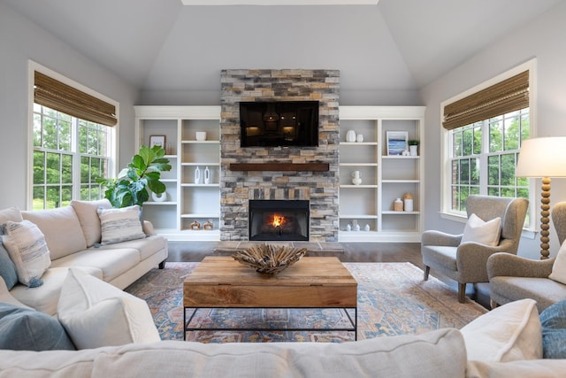 1825 Barnstaple Ln, Brentwood, TN 37027 - living area with vaulted ceiling, wood finished floors, and a stone fireplace