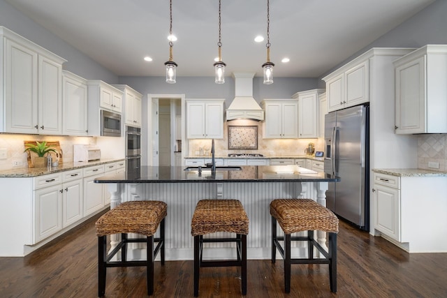 1825 Barnstaple Ln, Brentwood, TN 37027 - kitchen with appliances with stainless steel finishes, custom range hood, tasteful backsplash, recessed lighting, and white cabinets
