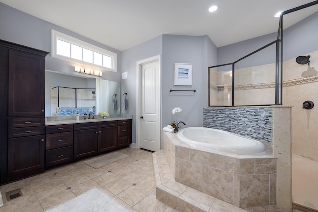 1825 Barnstaple Ln, Brentwood, TN 37027 - full bath with a garden tub, vanity, walk in shower, tile patterned floors, and baseboards