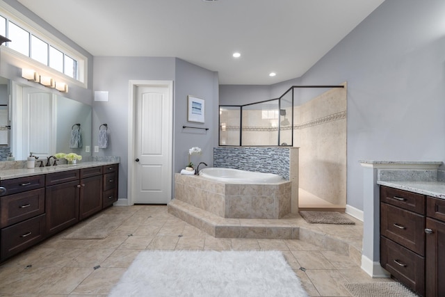 1825 Barnstaple Ln, Brentwood, TN 37027 - full bathroom featuring vanity, a tile shower, baseboards, a bath, and tile patterned floors
