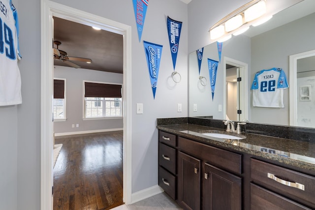 1825 Barnstaple Ln, Brentwood, TN 37027 - bathroom featuring baseboards, vanity, a ceiling fan, and wood finished floors