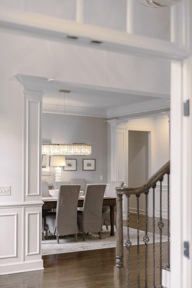 1825 Barnstaple Ln, Brentwood, TN 37027 - dining area with crown molding, wood finished floors, and ornate columns
