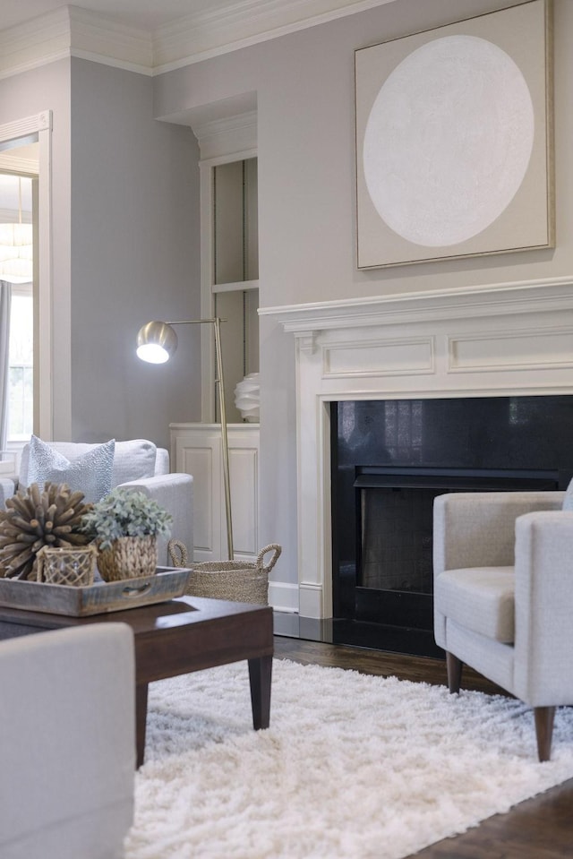 1825 Barnstaple Ln, Brentwood, TN 37027 - living area featuring ornamental molding, dark wood-style flooring, and a fireplace