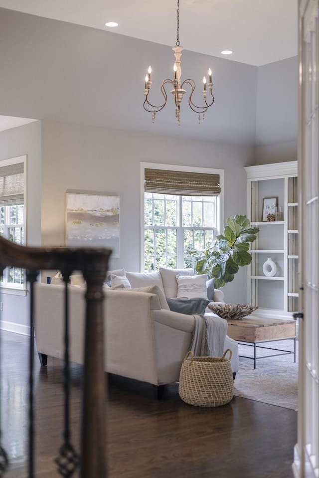 1825 Barnstaple Ln, Brentwood, TN 37027 - living room with a chandelier and dark wood-style flooring