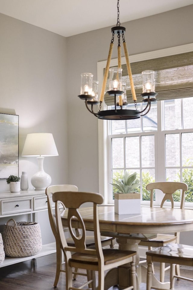 1825 Barnstaple Ln, Brentwood, TN 37027 - dining room with a chandelier, wood finished floors, and baseboards