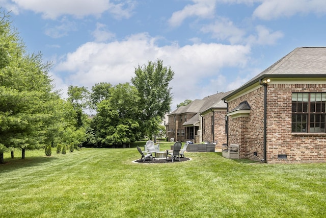 1825 Barnstaple Ln, Brentwood, TN 37027 - view of grassy yard with an outdoor living space with a fire pit and a patio area