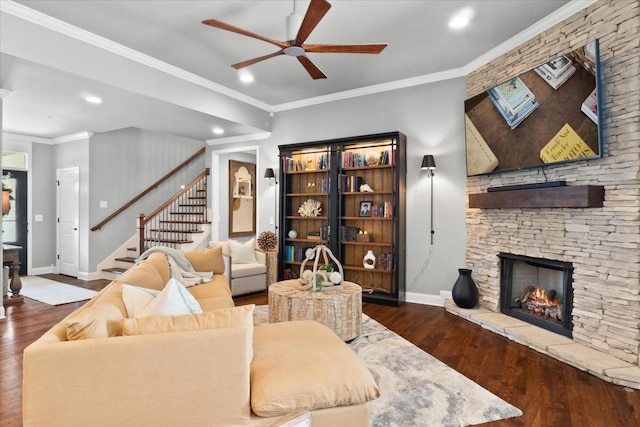 1076 Pretender Way, Columbia, TN 38401 - living room featuring a ceiling fan, wood finished floors, a fireplace, stairway, and baseboards
