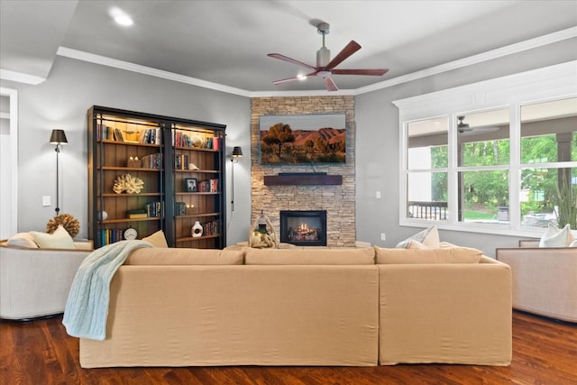 1076 Pretender Way, Columbia, TN 38401 - living area featuring a ceiling fan, a stone fireplace, dark wood-type flooring, and ornamental molding