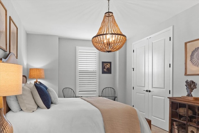1076 Pretender Way, Columbia, TN 38401 - bedroom with a chandelier, a closet, and light carpet