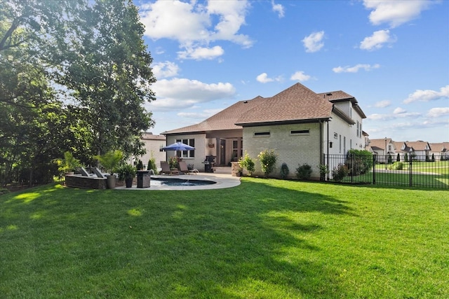 1076 Pretender Way, Columbia, TN 38401 - back of property with a patio, brick siding, and a shingled roof