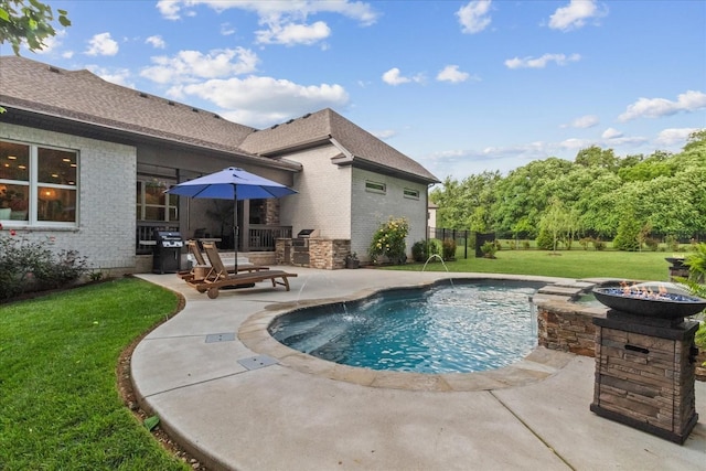 1076 Pretender Way, Columbia, TN 38401 - swimming pool with a patio area, a lawn, and an outdoor fire pit