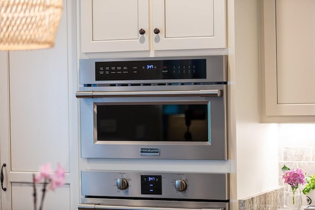 1076 Pretender Way, Columbia, TN 38401 - kitchen view of stainless steel oven, wall oven, and white cabinets
