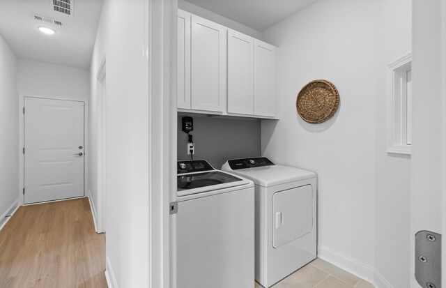 192 Sharp Way, Murfreesboro, TN 37128 - laundry room featuring cabinet space, independent washer and dryer, baseboards, and light wood finished floors