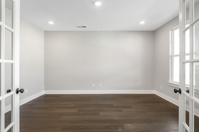 2655 Burton Dr, White House, TN 37188 - spare room featuring french doors, plenty of natural light, dark wood-style floors, and recessed lighting