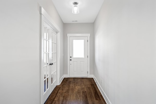 2655 Burton Dr, White House, TN 37188 - entryway with dark wood-style flooring and baseboards
