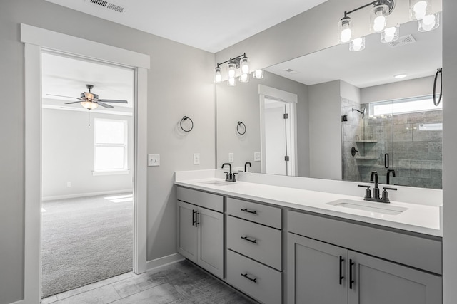 2655 Burton Dr, White House, TN 37188 - bathroom featuring double vanity, healthy amount of natural light, a ceiling fan, and a stall shower