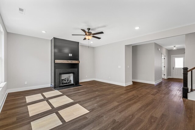 2655 Burton Dr, White House, TN 37188 - unfurnished living room with ceiling fan, baseboards, a fireplace, wood finished floors, and recessed lighting