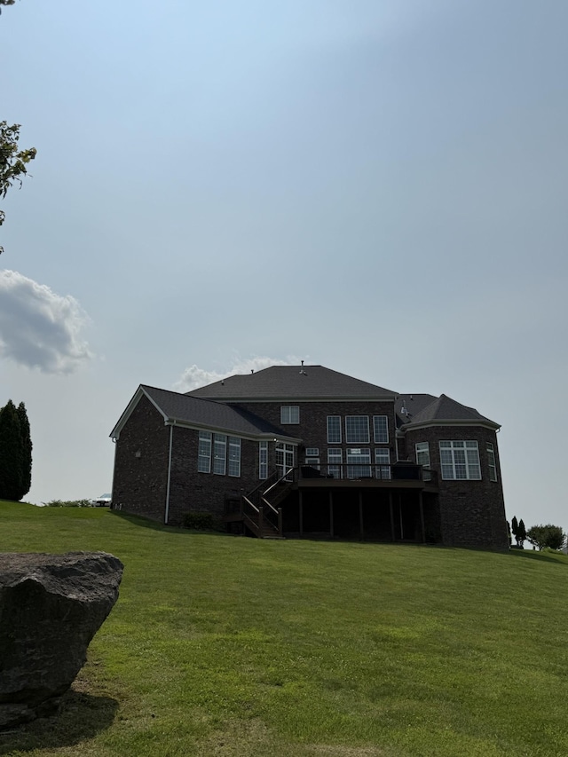 1822 Charity Dr, Brentwood, TN 37027 - rear view of house featuring stairway, a yard, a deck, and brick siding