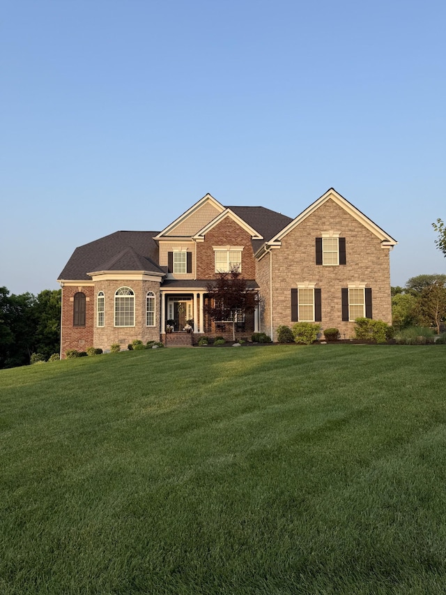 1822 Charity Dr, Brentwood, TN 37027 - view of front facade with a front yard and brick siding