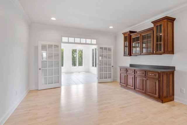254 Davis Rd, Lebanon, TN 37087 - unfurnished dining area with french doors, crown molding, light wood-style floors, and recessed lighting