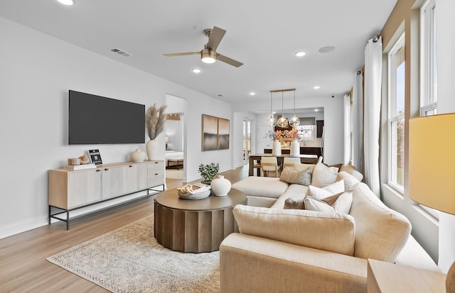 310 Sharp Way, Murfreesboro, TN 37128 - living area featuring wood finished floors, a ceiling fan, recessed lighting, a chandelier, and baseboards