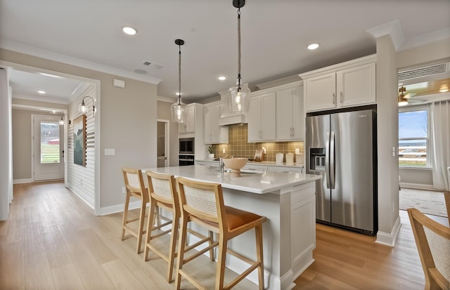 318 Sharp Way, Murfreesboro, TN 37128 - kitchen featuring appliances with stainless steel finishes, ornamental molding, light countertops, backsplash, and white cabinetry