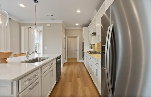 318 Sharp Way, Murfreesboro, TN 37128 - kitchen with appliances with stainless steel finishes, a sink, recessed lighting, white cabinets, and crown molding
