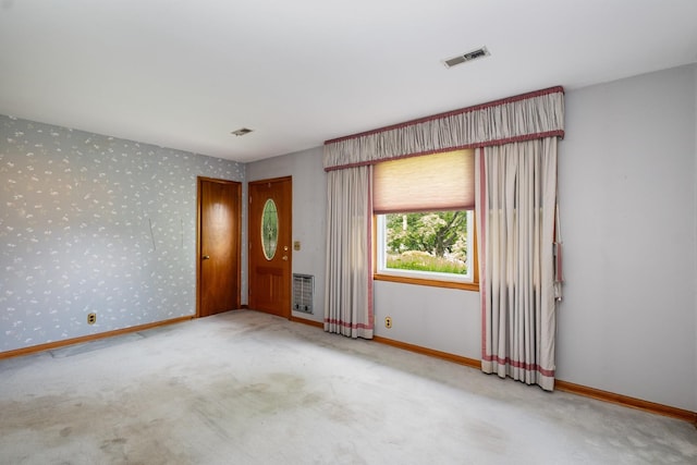 924 Shauna Dr, Nashville, TN 37214 - carpeted empty room with wallpapered walls, baseboards, and heating unit