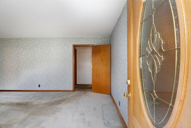 924 Shauna Dr, Nashville, TN 37214 - unfurnished bedroom featuring wallpapered walls, carpet, baseboards, and vaulted ceiling