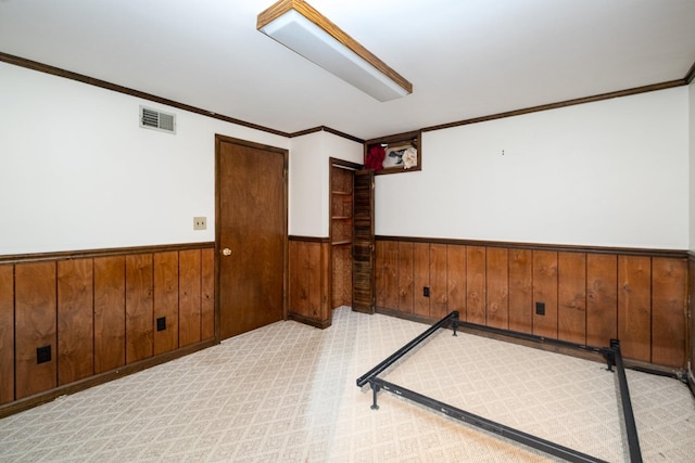 924 Shauna Dr, Nashville, TN 37214 - empty room with wainscoting, wood walls, and crown molding