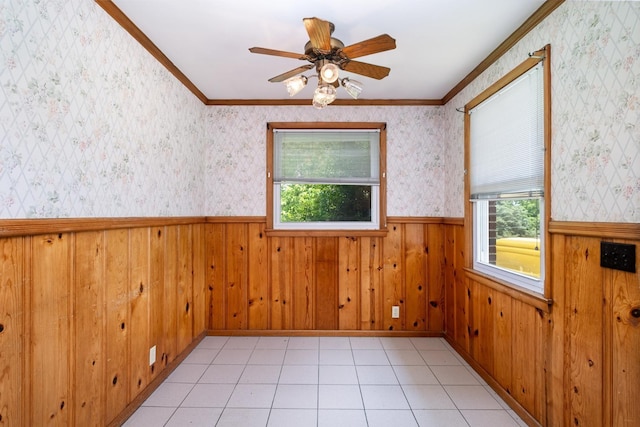 924 Shauna Dr, Nashville, TN 37214 - empty room with a wainscoted wall, ceiling fan, wallpapered walls, crown molding, and wooden walls