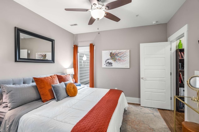 3303 Gallatin Pike Unit 202, Nashville, TN 37216 - bedroom featuring wood finished floors, baseboards, and a ceiling fan
