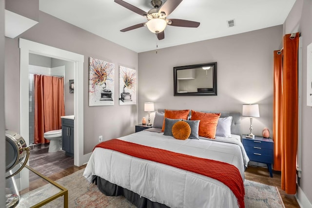 3303 Gallatin Pike Unit 202, Nashville, TN 37216 - bedroom with wood finished floors, baseboards, ensuite bathroom, and a ceiling fan