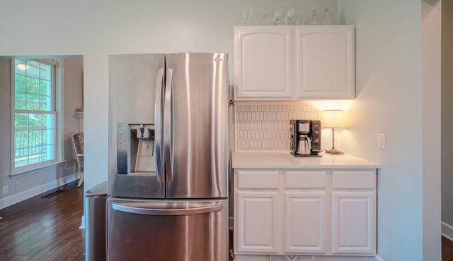 3302 Foxtrot Ct, Spring Hill, TN 37174 - kitchen with stainless steel fridge with ice dispenser, white cabinets, dark wood finished floors, baseboards, and light countertops
