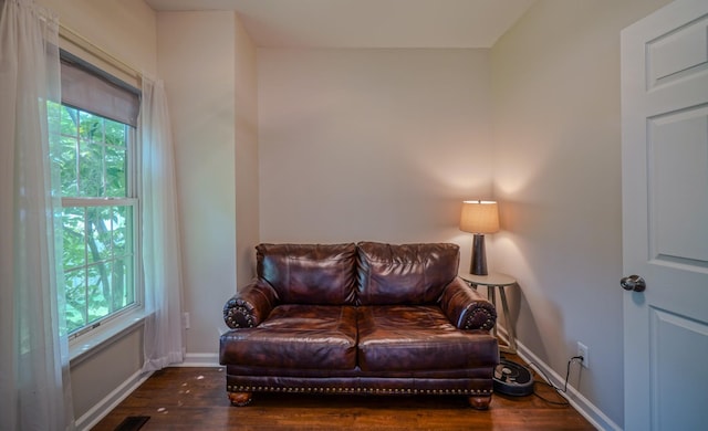 3302 Foxtrot Ct, Spring Hill, TN 37174 - living area featuring plenty of natural light, wood finished floors, and baseboards