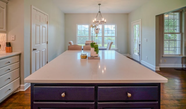 3302 Foxtrot Ct, Spring Hill, TN 37174 - kitchen with dark wood finished floors, light countertops, and healthy amount of natural light