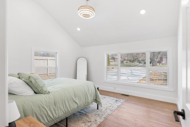 408 Adair Rd, Nashville, TN 37214 - bedroom featuring lofted ceiling, baseboards, multiple windows, wood finished floors, and recessed lighting