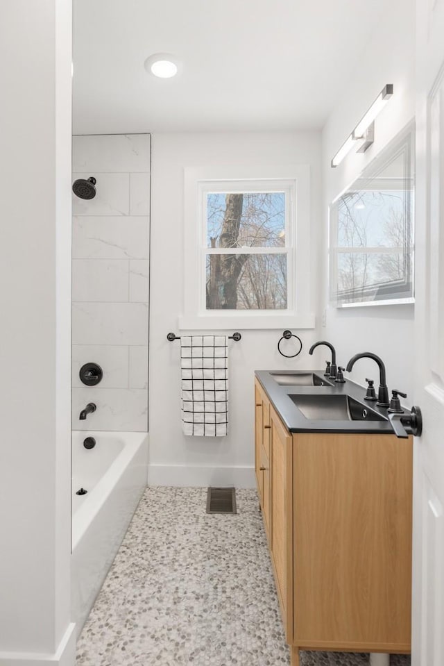 408 Adair Rd, Nashville, TN 37214 - full bath with vanity, baseboards, and bathtub / shower combination