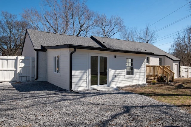 408 Adair Rd, Nashville, TN 37214 - back of property featuring roof with shingles, a deck, and a gate
