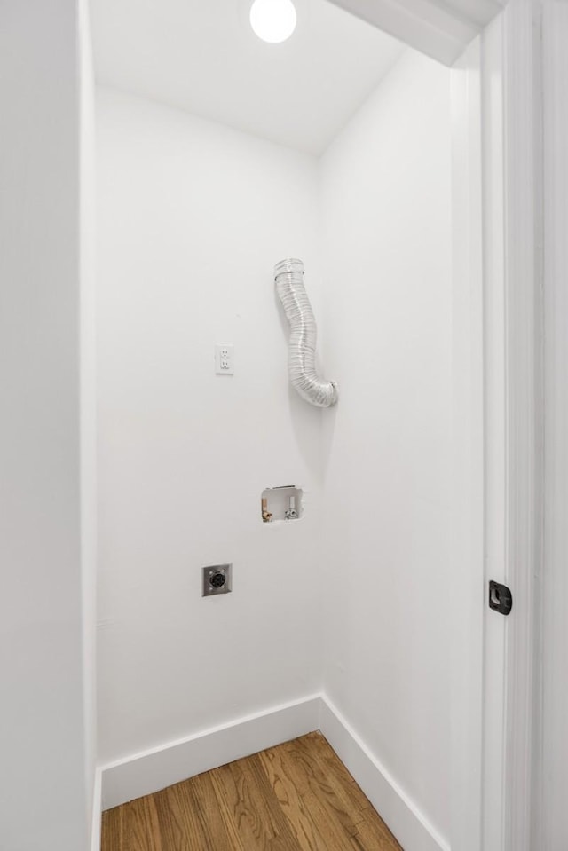 408 Adair Rd, Nashville, TN 37214 - laundry area featuring hookup for an electric dryer, hookup for a washing machine, light wood-style flooring, and baseboards