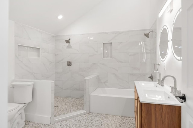 408 Adair Rd, Nashville, TN 37214 - bathroom featuring toilet, double vanity, speckle patterned floor, recessed lighting, and lofted ceiling