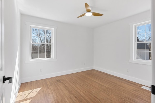 408 Adair Rd, Nashville, TN 37214 - unfurnished room with plenty of natural light, ceiling fan, baseboards, and wood finished floors