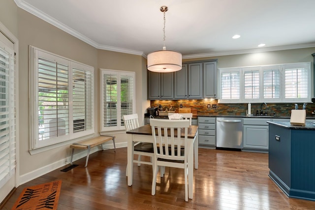 106 Ashton Park Blvd, Franklin, TN 37067 - kitchen with dishwasher, dark countertops, a sink, decorative backsplash, and crown molding